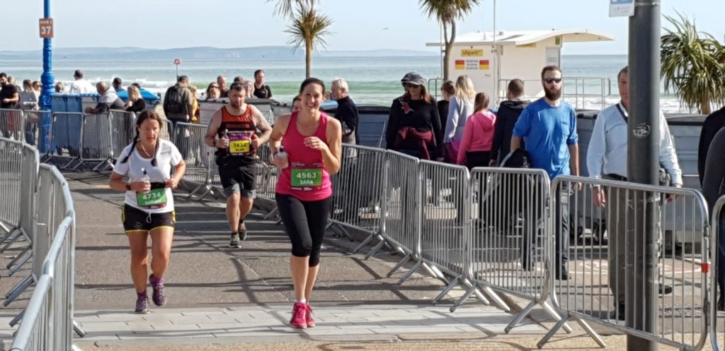 Me running the Bournemouth marathon towards Bournemouth Pier