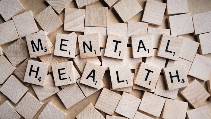 Is Massage Good For Mental Health - Mental health written in wooden blocks