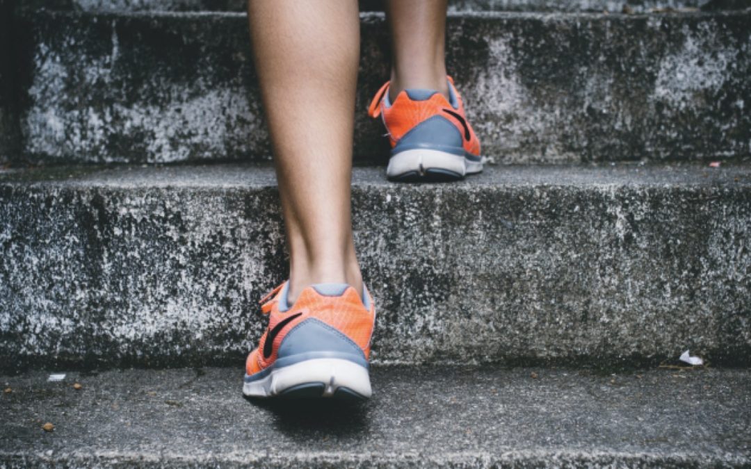 Couch to 5K - Person walking up steps in trainers
