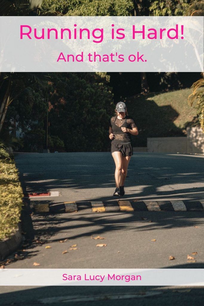 Running is hard - woman running with baseball cap on.